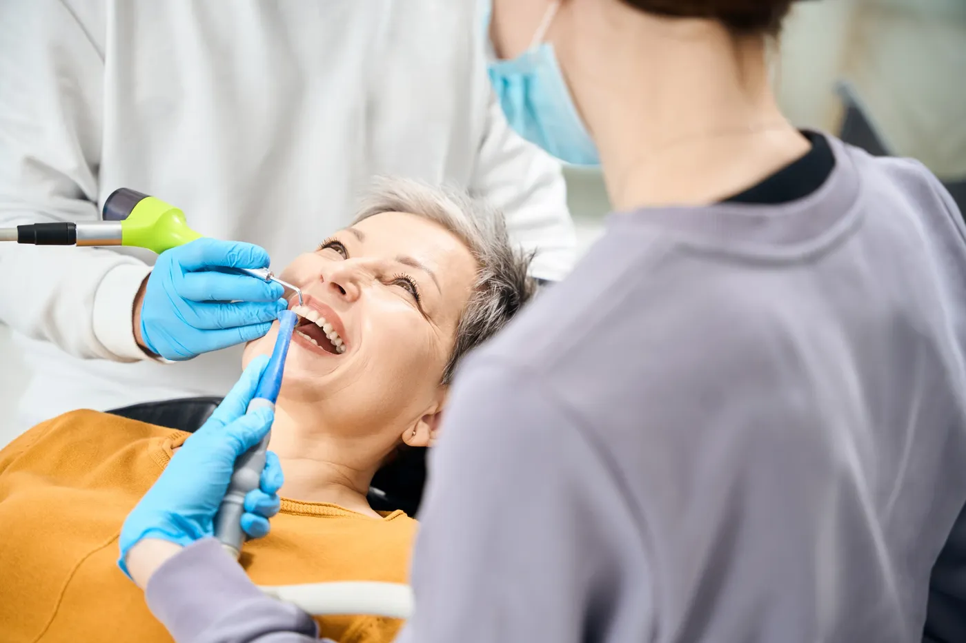 Patient receiving a professional dental cleaning at Indian Trace Dental